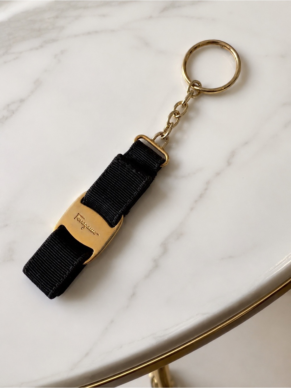 Salvatore Ferragamo Vara Bow keychain featuring black grosgrain ribbon preloved